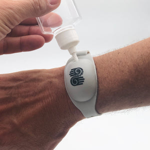 Adding Hand Sanitizer to refillable bracelet by HandiGuru